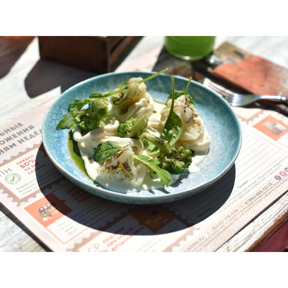 Кальмары в сливочном соусе